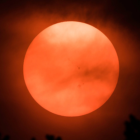 Smoky skies and sunspots